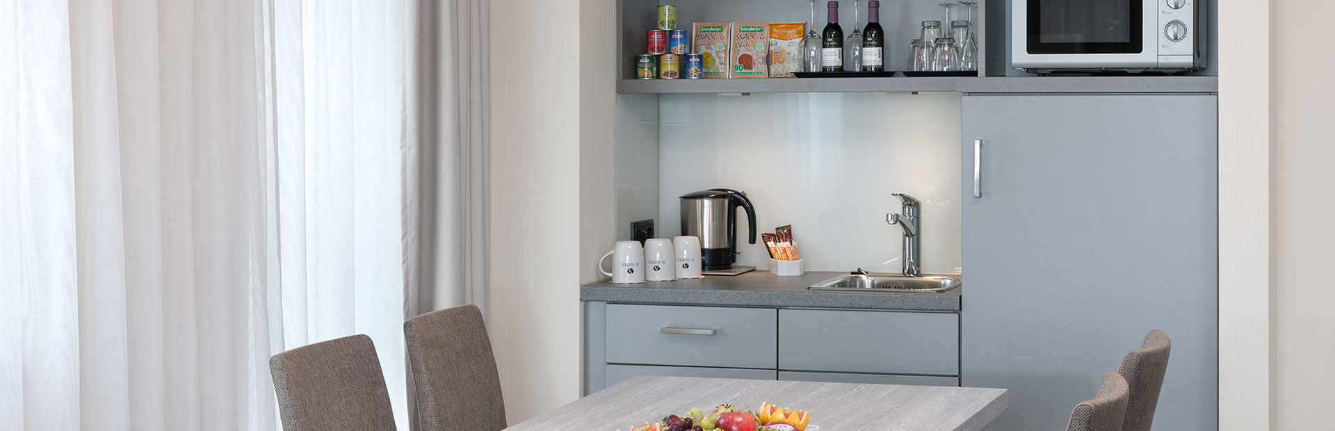 Bild des Superior Zimmers mit Kitchenette im SI-SUITES Hotel Stuttgart